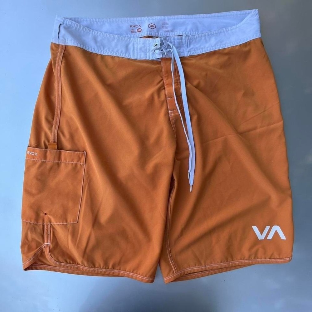 RVCA men's board shorts in orange and white
